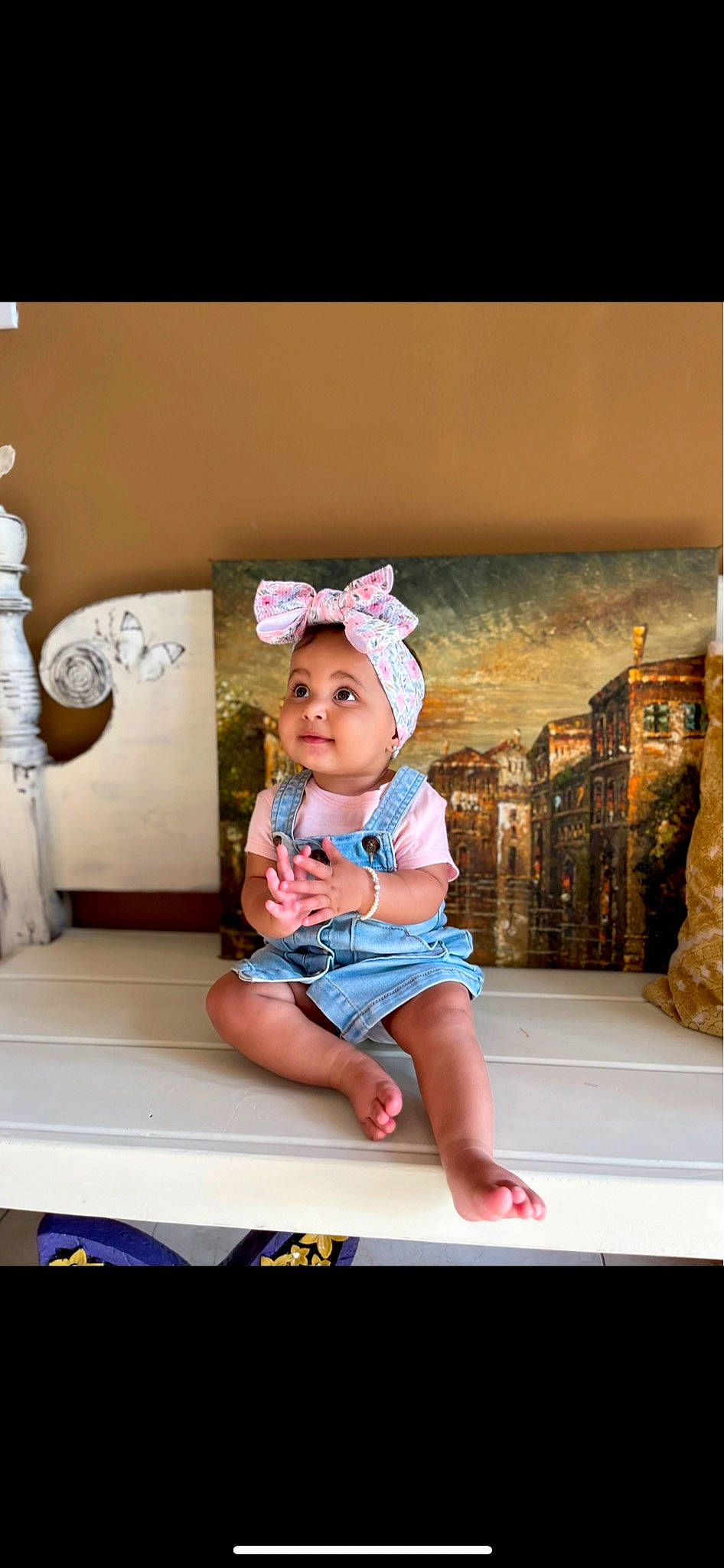 Lillie is registered to the contest to win money with this photo: baby, baby_toddler_clothing, child, flash_photography, flooring, fun, happy, headwear, human_leg, leisure, magenta, person, pink, play, portrait_photography, room, sitting, sleeve, snapshot, stock_photography