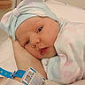 Alina joined the competition — help win amazing prizes! newborn, baby, infant, hand, hospital_wristband, blanket, hat, bow, face, sleepy, resting, wrapped, pastel_colors, closeup, indoors, person, skin, cute, soft, hospital