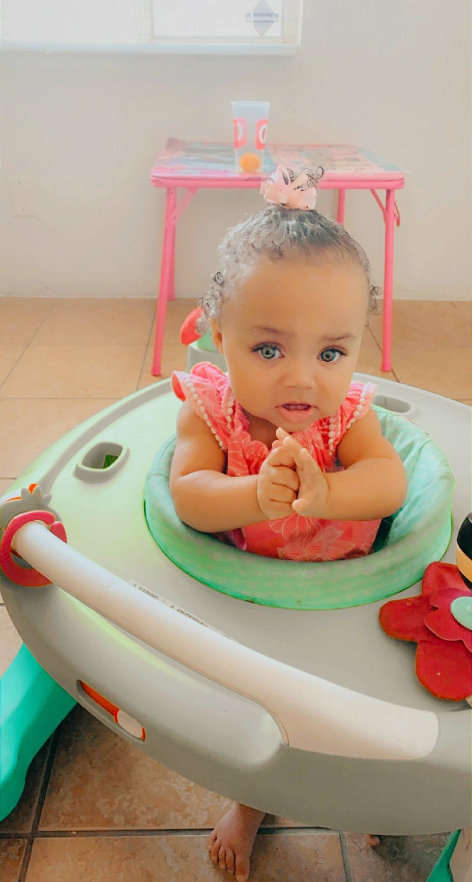 Monay is registered to the contest to win money with this photo: baby, baby_playing_with_toys, baby_products, baby_toddler_clothing, baby_toys, beauty, chair, child, facial_expression, fun, hairstyle, hand, happy, head, leisure, person, pink, skin, table, toddler