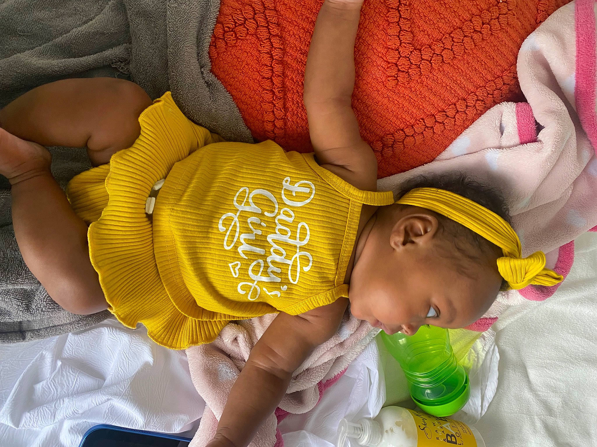 Honesty is registered to the contest to win money with this photo: abdomen, chest, child, elbow, fashion_accessory, finger, gesture, happy, hat, headgear, human_body, human_leg, nail, nap, pattern, person, thigh, thread, thumb, toddler