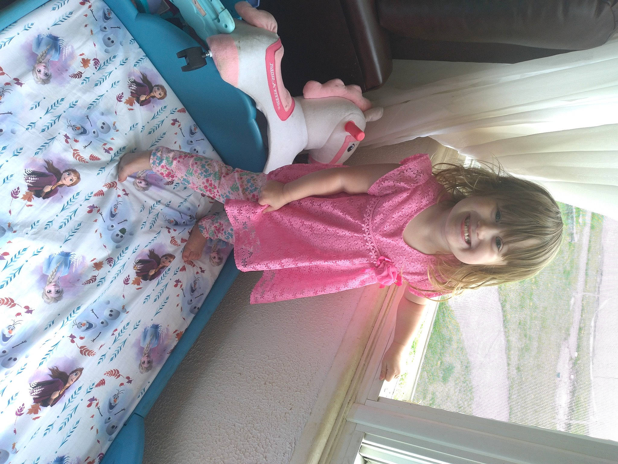 Marissa joined the competition — help win amazing prizes! carmine, child, dress, fun, happy, joy, linens, magenta, pattern, person, pink, plaid, room, skin, smile, textile, toddler, toy, tree, window