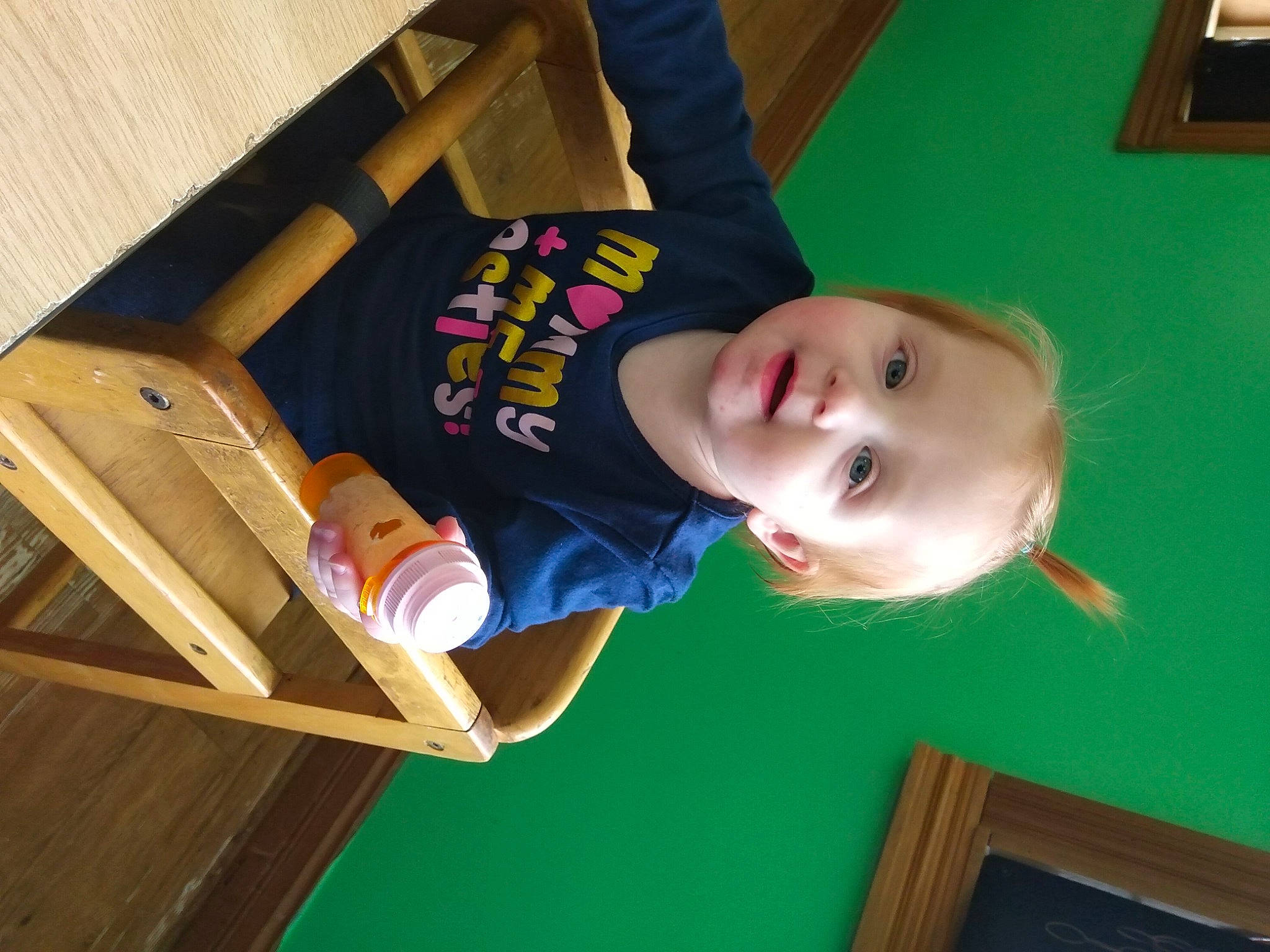 Maelynn is registered to the contest to win money with this photo: baby, baby_products, baby_toddler_clothing, child, flooring, fun, happy, hardwood, leisure, person, picture_frame, play, product, room, sitting, smile, toddler, vacation, varnish, wood
