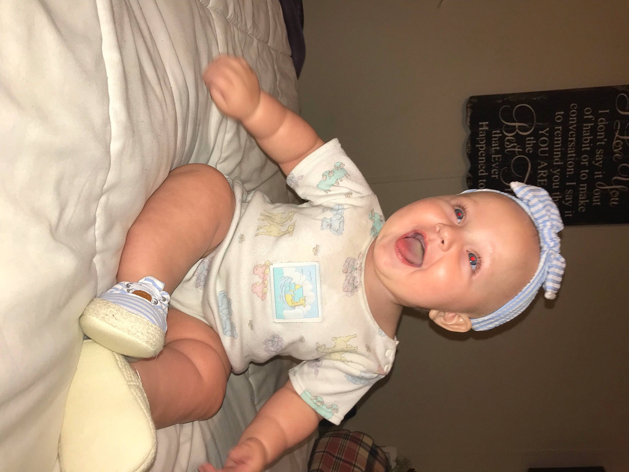 Hadlee is registered to the contest to win money with this photo: abdomen, arm, baby, baby_toddler_clothing, cheek, comfort, eye, finger, gesture, hand, head, human_body, leg, mouth, nose, person, skin, smile, stomach, thumb