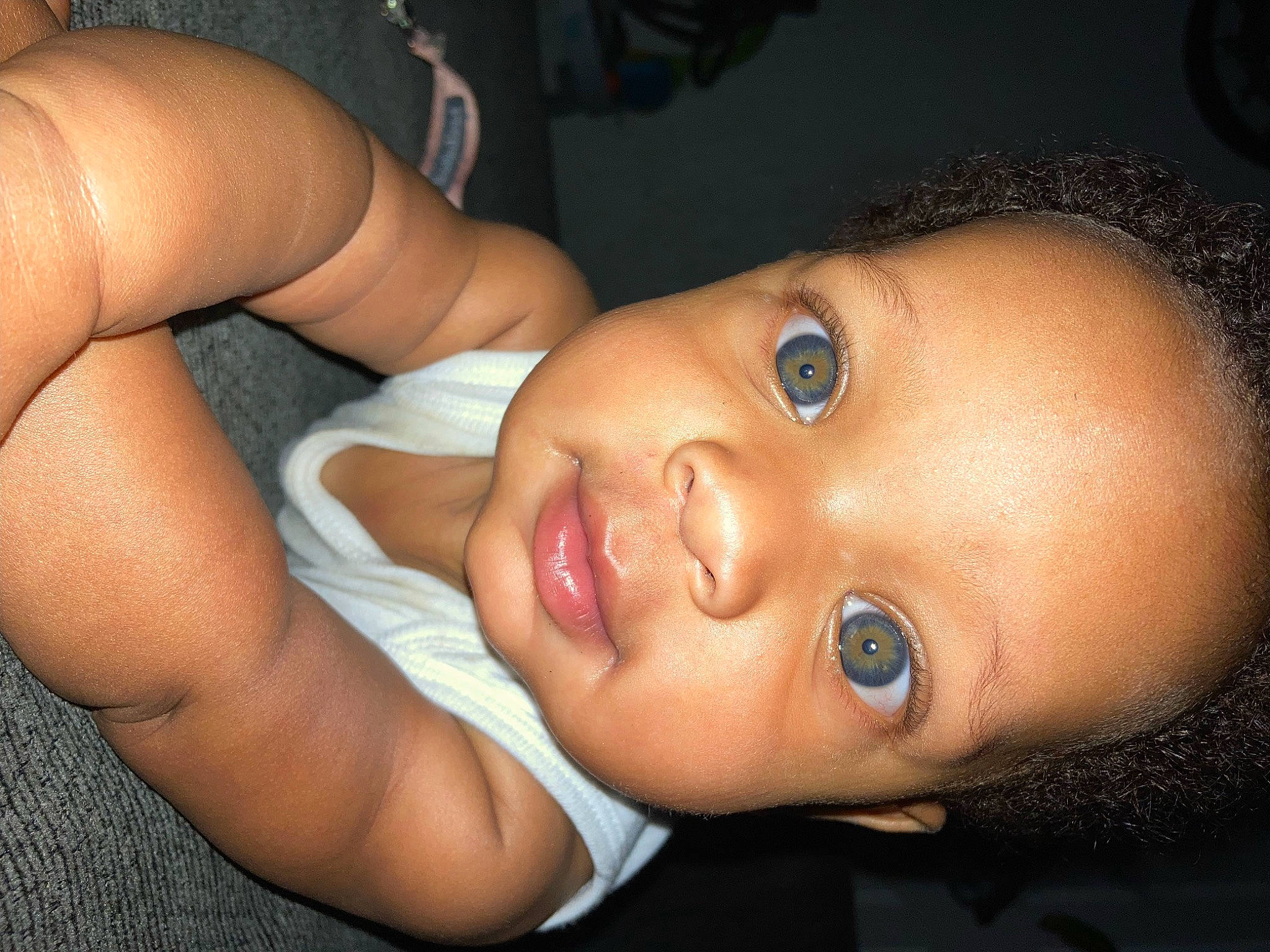 Ndiyahh is registered to the contest to win money with this photo: baby, cheek, chest, child, ear, eyelash, finger, flash_photography, fun, gesture, human_body, iris, jaw, lip, mouth, neck, nose, person, skin, smile