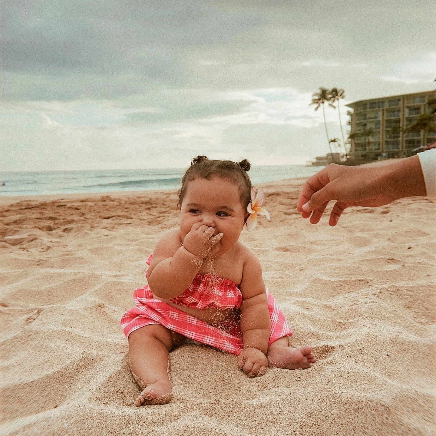 Kaili-Reign is registered to the contest to win money with this photo: baby, beach, child, clouds, cute, dress, flower, fun, hand, holiday, nature, ocean, outdoor, palm_trees, playful, sand, sky, smiling, toddler, vacation