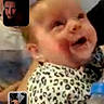 baby, child, toddler, infant, smiling, laughing, portrait, close_up, indoor, phone_screenshot, video_call, picture_in_picture, leopard_print, onesie, clothing, bottle, playful, family, face, home