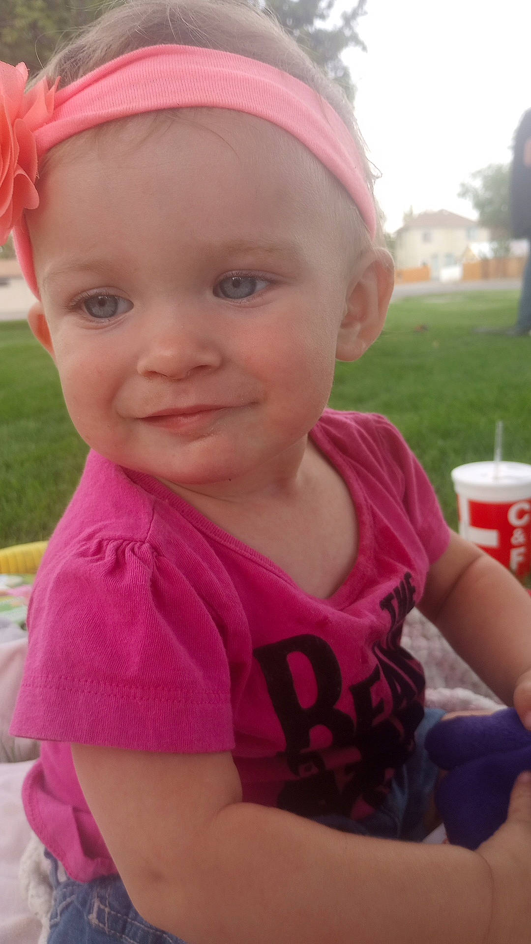 Jerrichai is registered to the contest to win money with this photo: baby, baby_toddler_clothing, beauty, child, cool, fun, grass, happy, headband, headgear, headpiece, joy, leisure, lip, magenta, person, pink, recreation, skin, smile