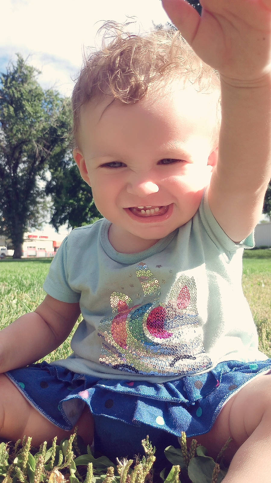 Jerrichai is registered to the contest to win money with this photo: baby_toddler_clothing, cheek, chin, cool, eye, facial_expression, finger, gesture, grass, happy, iris, joy, light, lip, nose, people_in_nature, person, plant, skin, smile