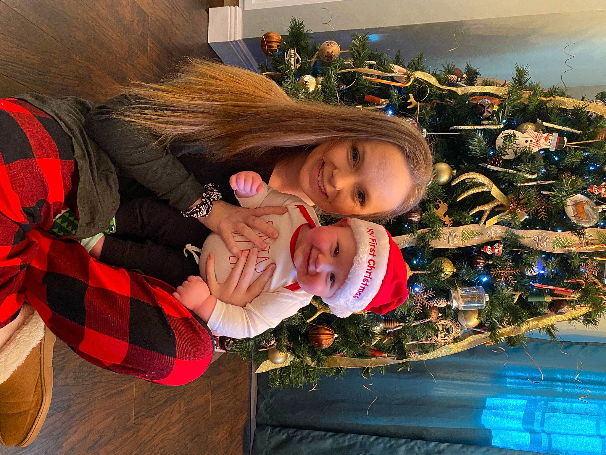Remington joined the competition — help win amazing prizes! child, christmas, christmas_decoration, christmas_eve, christmas_ornament, christmas_tree, event, fun, happy, headwear, holiday, holiday_ornament, joy, lap, leisure, ornament, person, plant, smile, tartan