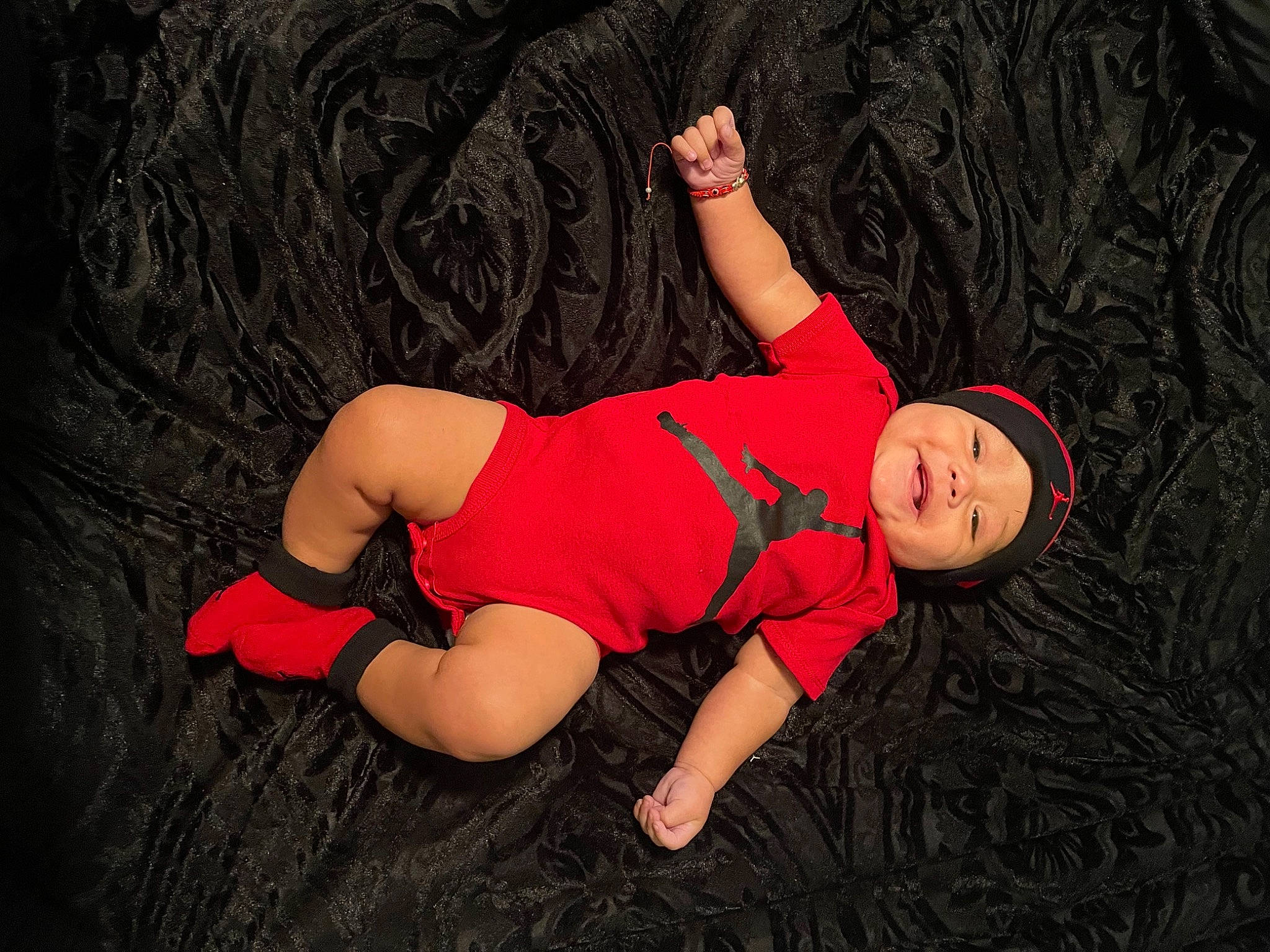 Jesus is registered to the contest to win money with this photo: arm, darkness, elbow, finger, flash_photography, foot, fun, grass, headwear, human_body, human_leg, knee, magenta, people_in_nature, person, shorts, sportswear, standing, t_shirt, thigh