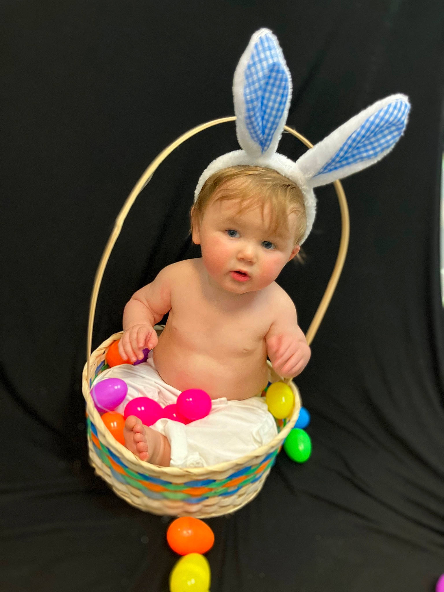 Liam is registered to the contest to win money with this photo: baby, baby_products, baby_toddler_clothing, baby_toys, basket, bathing, child, costume_hat, diaper, event, fashion_accessory, fun, happy, headpiece, home_accessories, jewellery, person, play, sitting, sweetness