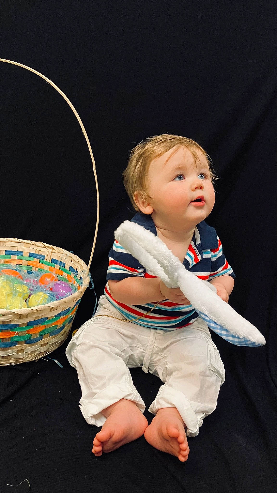 Liam is registered to the contest to win money with this photo: baby, baby_toddler_clothing, barefoot, basket, cheek, child, elbow, entertainment, event, flash_photography, foot, fun, performing_arts, person, play, sitting, sleeve, t_shirt, toddler, trampolining_equipment_and_supplies