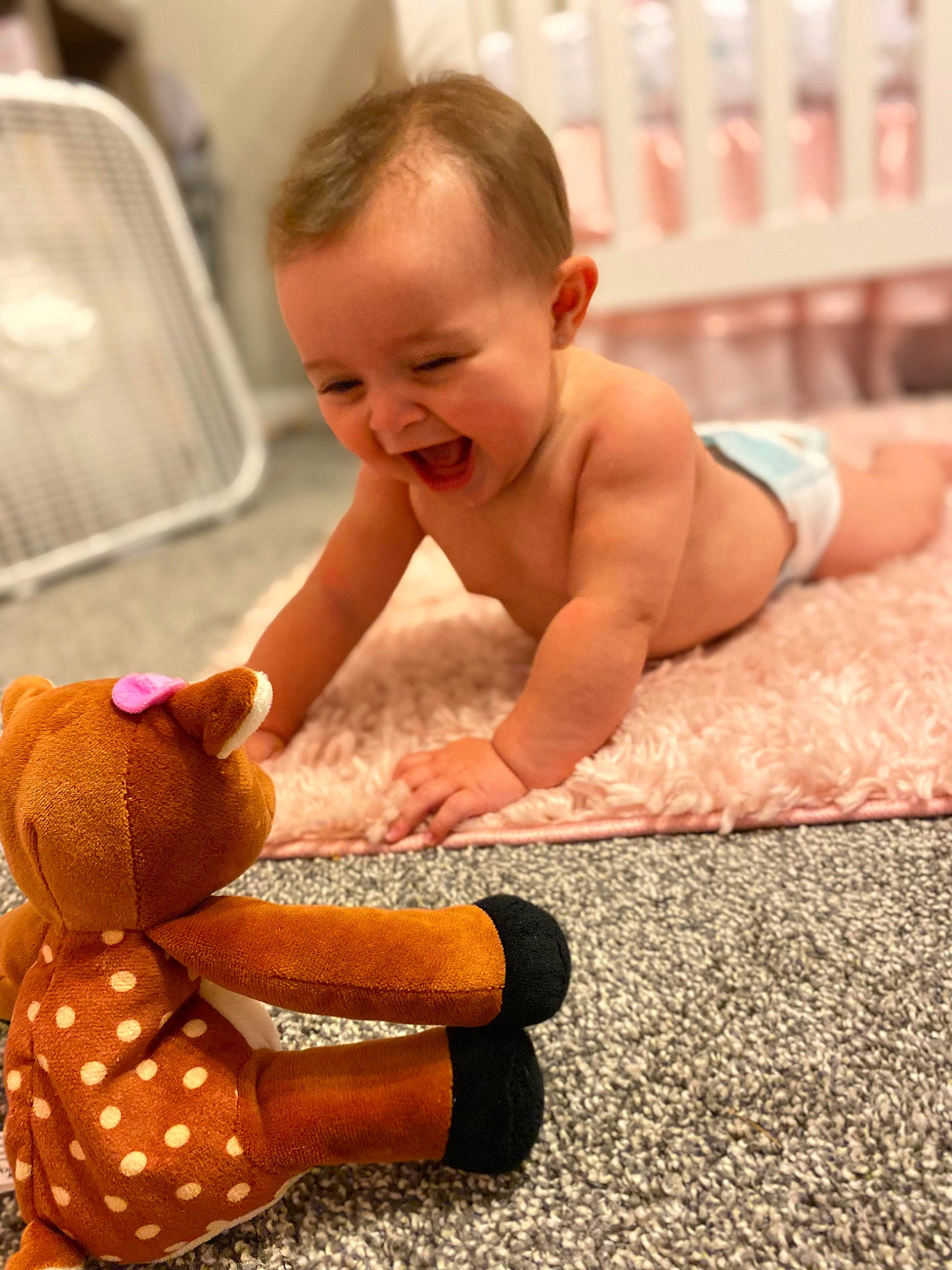 Annslee is registered to the contest to win money with this photo: arm, baby, barechested, barefoot, chest, child, flooring, foot, happy, human_leg, knee, nail, person, smile, stuffed_toy, thigh, thumb, toddler, toy, vertebrate