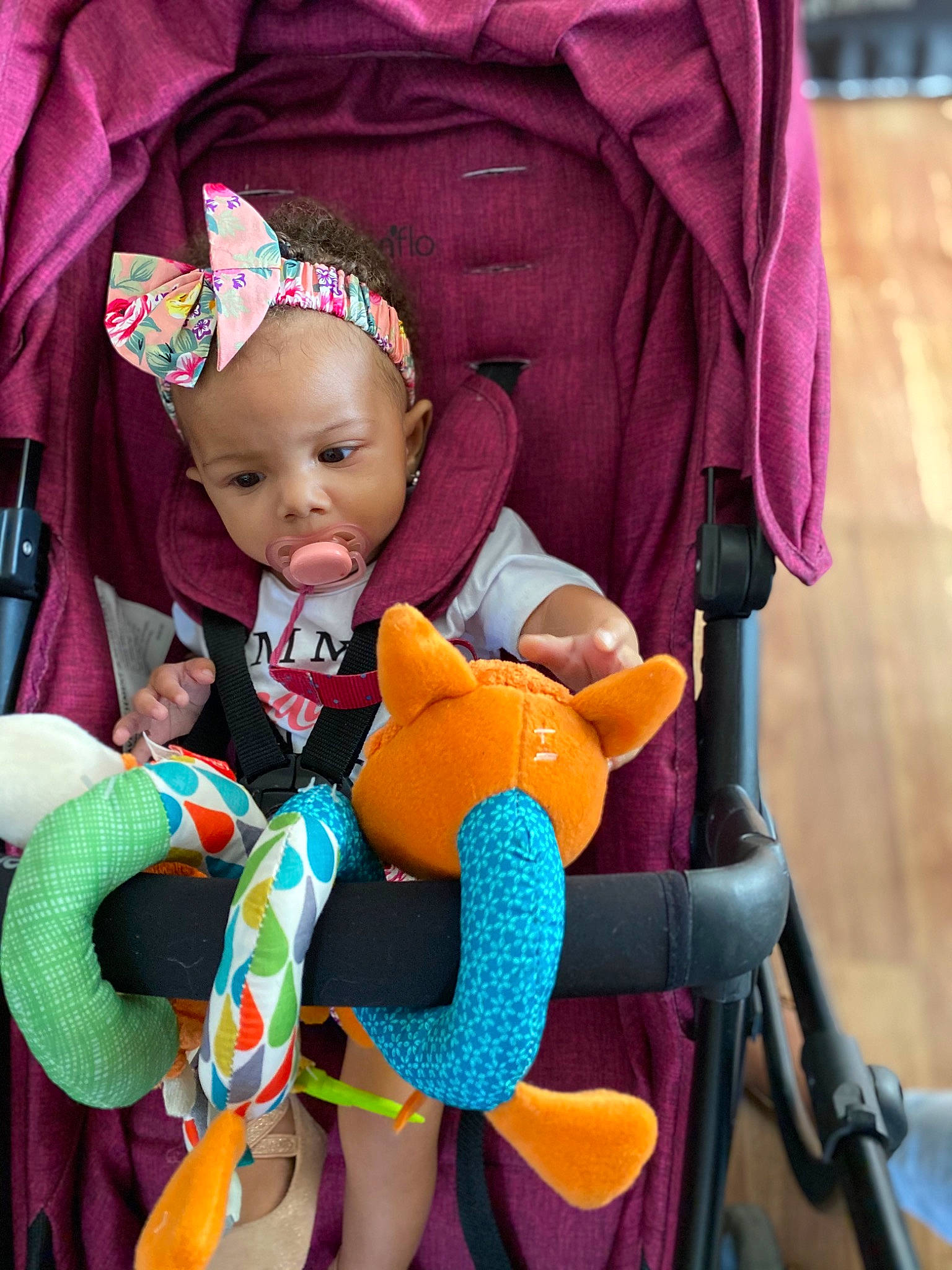 Annalayah is registered to the contest to win money with this photo: baby, baby_carriage, baby_toddler_clothing, child, cool, eye, happy, head, headgear, human_body, organ, person, photograph, pink, product, purple, red, skin, textile, toddler