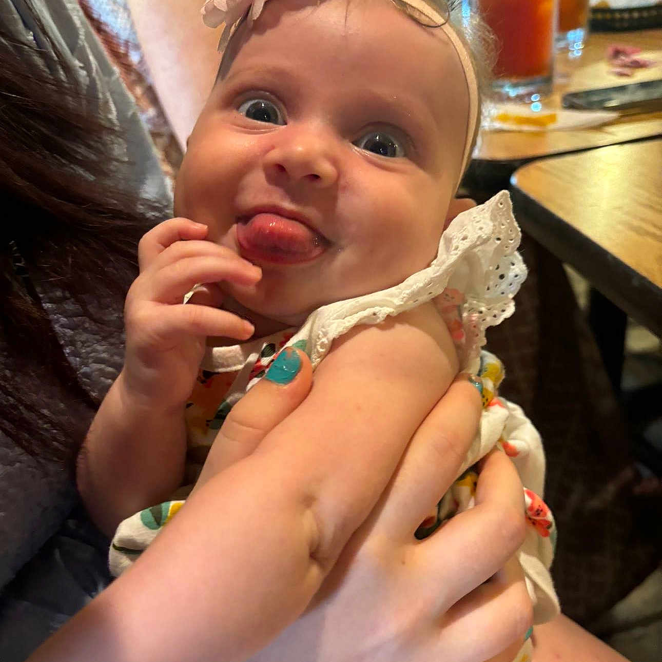 Jazmyn is registered to the contest to win money with this photo: accessories, baby, beverage, bodypart, cream, cutlery, dessert, face, finger, food, furniture, hand, happy, head, icecream, person, photography, portrait, soda, spoon