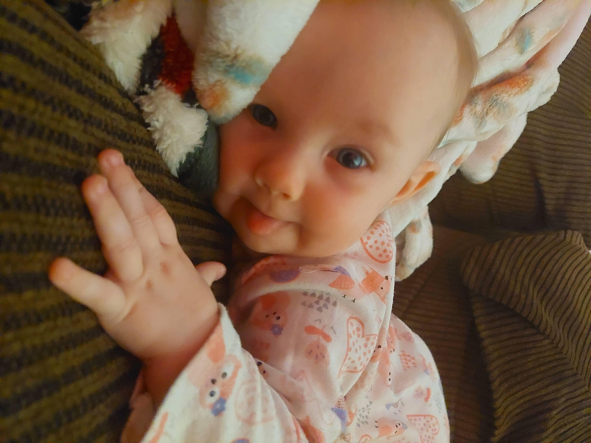 Emberly is registered to the contest to win money with this photo: baby_toddler_clothing, cheek, chin, ear, eye, eyelash, facial_expression, finger, gesture, hair, hairstyle, hand, happy, head, iris, lip, mouth, nose, person, skin