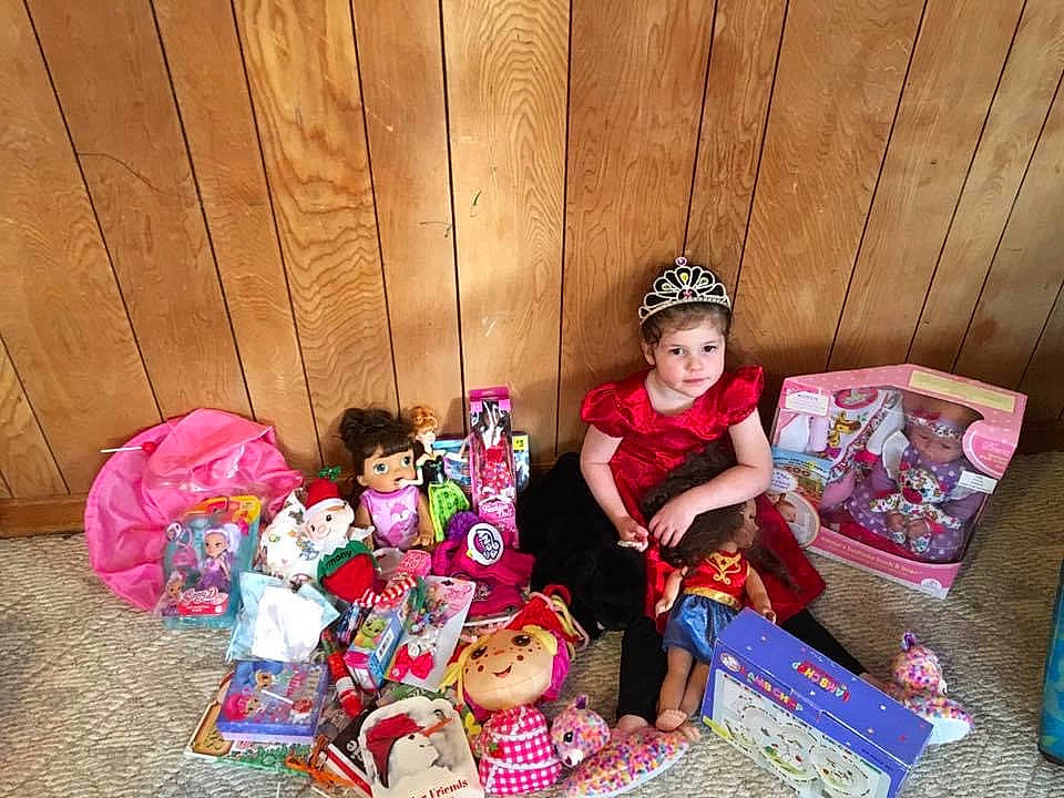 Harmony is registered to the contest to win money with this photo: baby_toddler_clothing, child, doll, event, fashion_accessory, flooring, fun, hat, leisure, magenta, person, pink, play, purple, room, sitting, sunglasses, toddler, toy, tree