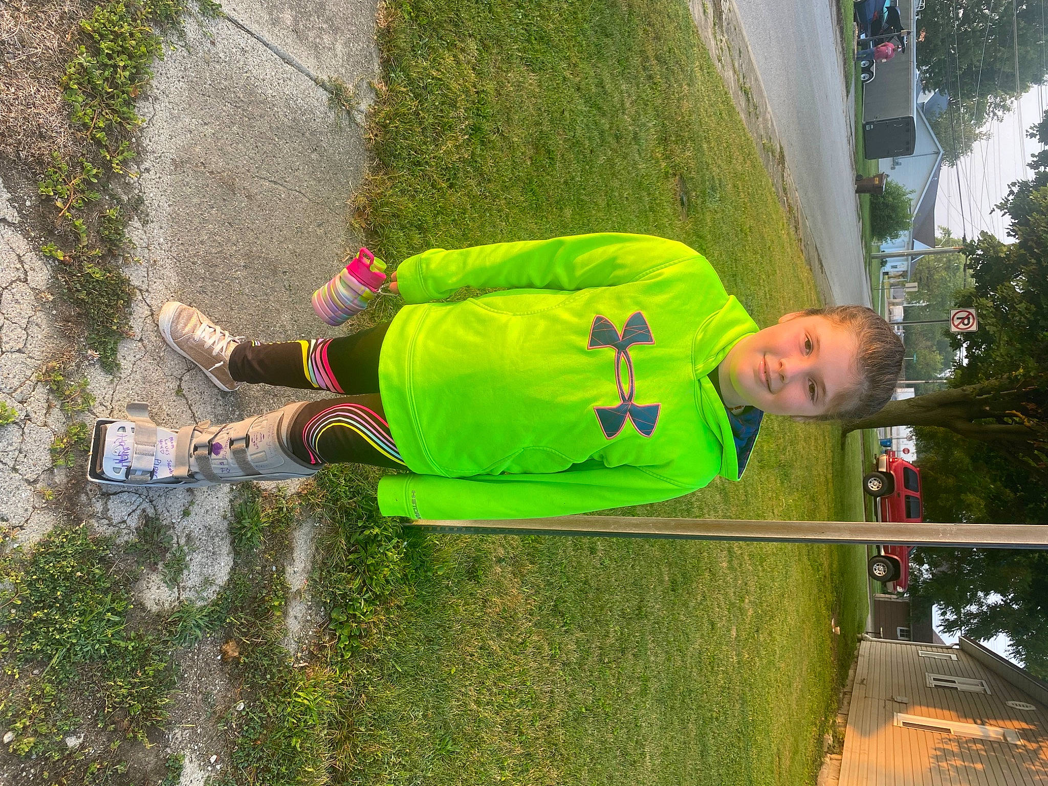 Harmony is registered to the contest to win money with this photo: asphalt, fun, grass, joy, landscape, lawn, leaf, leisure, nature, people_in_nature, person, plant, recreation, shrub, sidewalk, soil, toddler, tree, walking_shoe