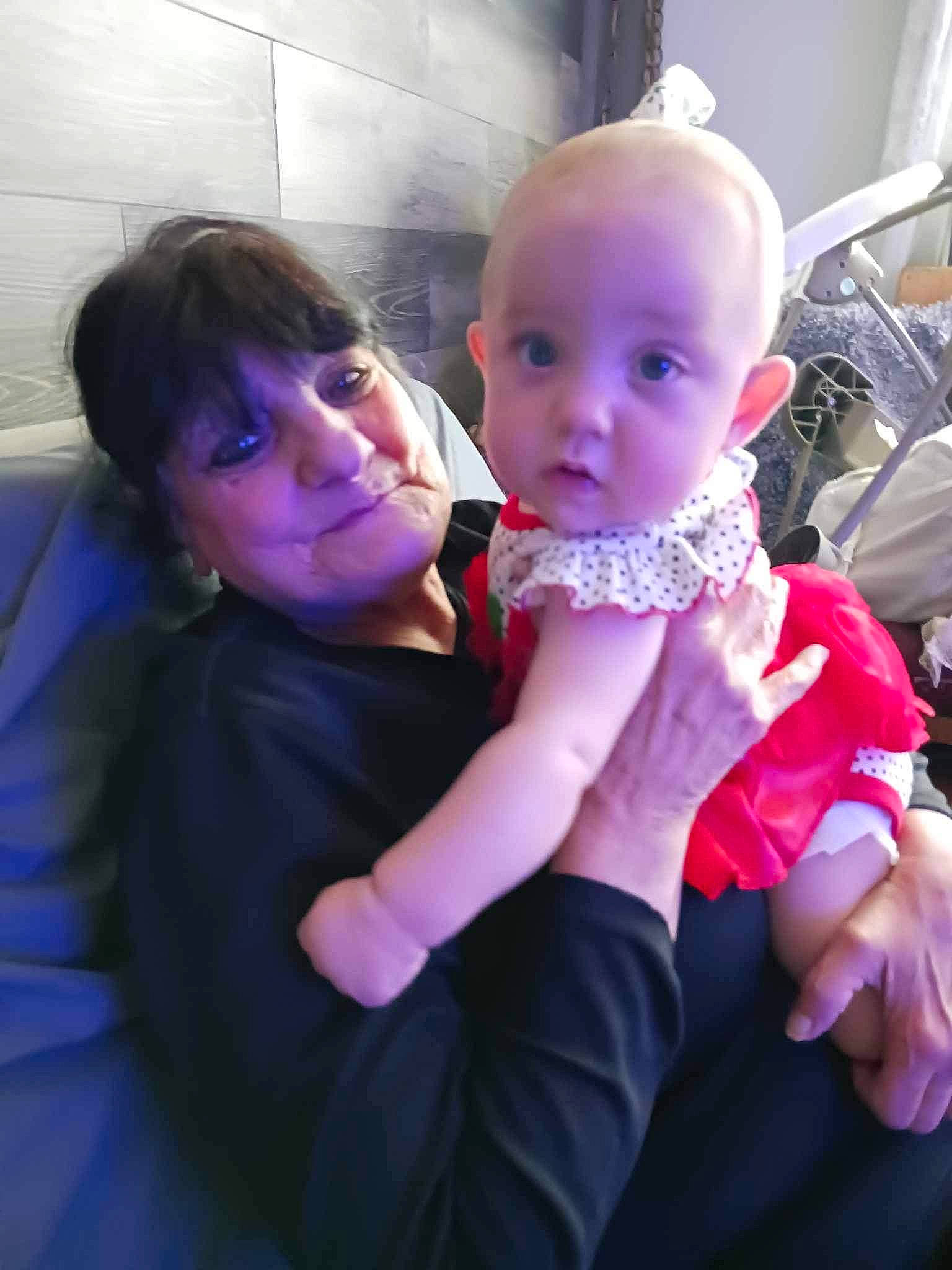 Scarlett is registered to the contest to win money with this photo: baby, baby_toddler_clothing, cheek, child, comfort, eye, fun, gesture, happy, iris, lap, lip, magenta, mouth, people, person, pink, purple, skin, smile