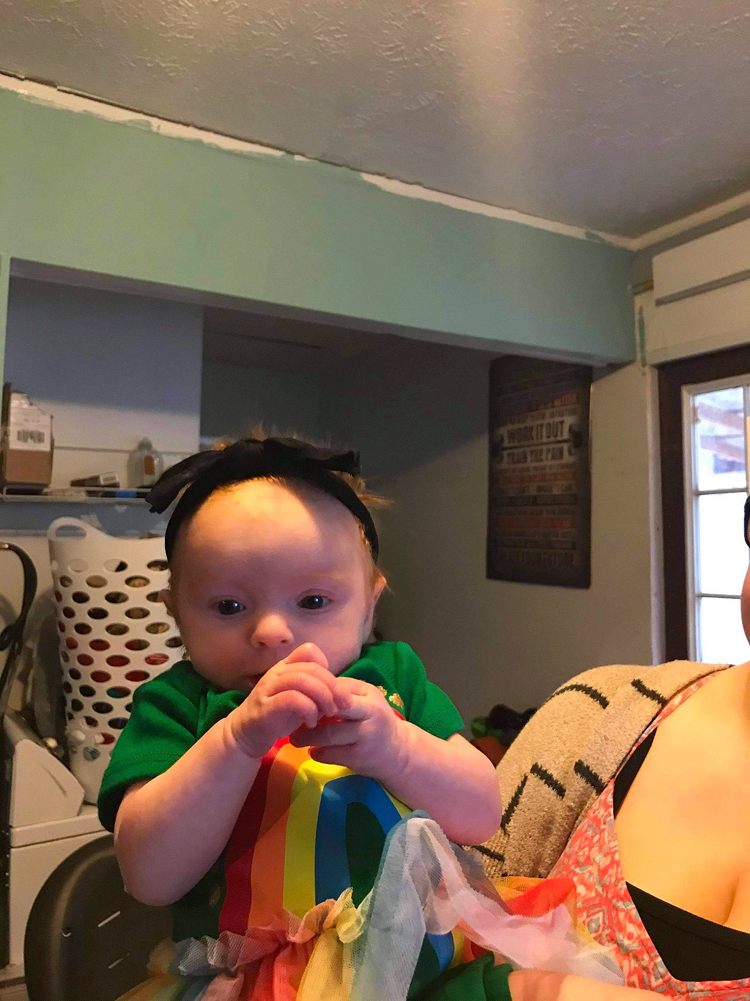 Winter is registered to the contest to win money with this photo: baby, brassiere, ceiling, chair, chest, child, comfort, event, finger, fun, hairstyle, happy, party, person, room, sitting, thumb, toddler, vacation, window