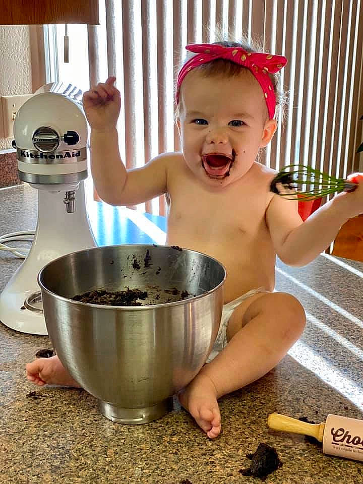 Presley is registered to the contest to win money with this photo: baking, child, cook, food, person, play, toddler