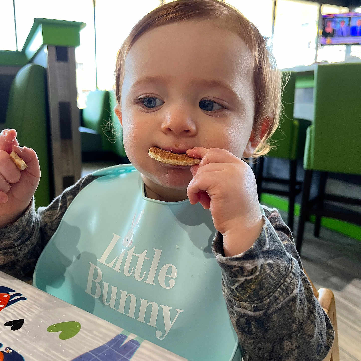 ĩolani is registered to the contest to win money with this photo: baby, bodypart, bread, chair, computerhardware, cutlery, eating, electronics, face, finger, food, furniture, hand, hardware, head, monitor, person, photography, portrait, screen