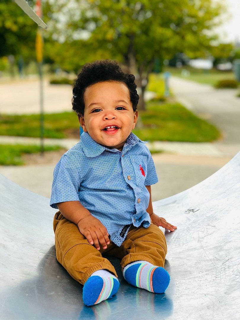 Marcellus is registered to the contest to win money with this photo: baby, beauty, blue, cheek, child, facial_expression, footwear, happy, people, person, photograph, photography, play, portrait_photography, recreation, sitting, skin, smile, toddler, vacation