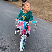Nyalia joined the competition — help win amazing prizes! bicycle, car, child, clothing, cycling, e_scooter, face, female, footwear, girl, head, machine, person, shoe, sitting, sleeve, sport, transportation, vehicle, wheel