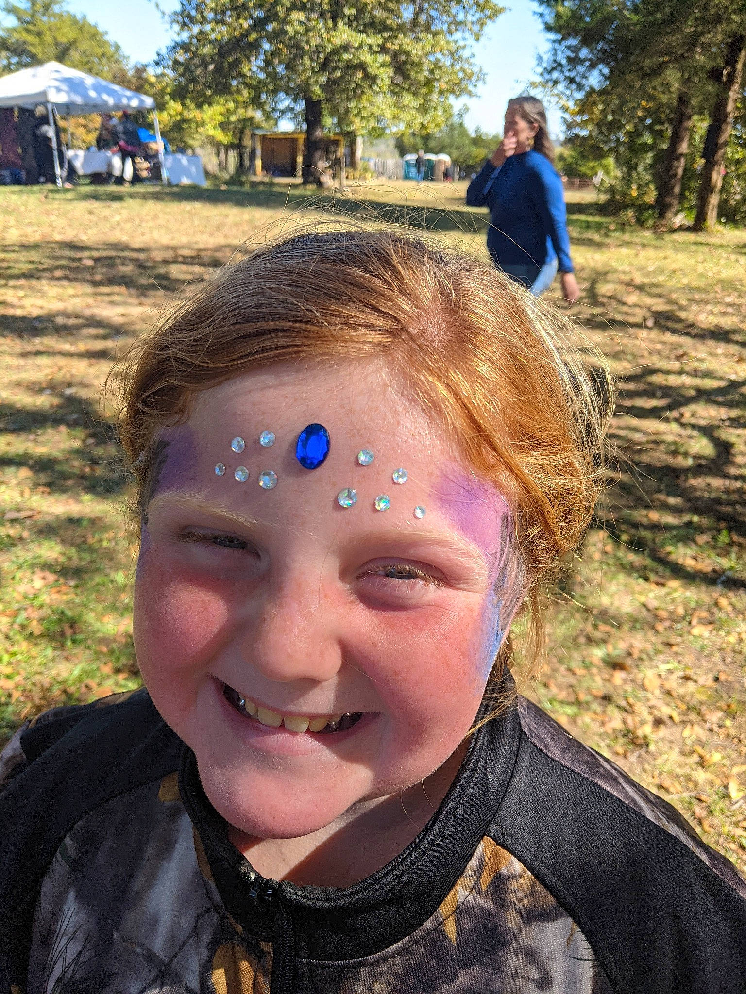 Jayla is registered to the contest to win money with this photo: blue, eyelash, eyewear, fun, grass, hair, happy, joy, landscape, laugh, leisure, people, person, personal_protective_equipment, recreation, selfie, smile, soil, t_shirt, toddler