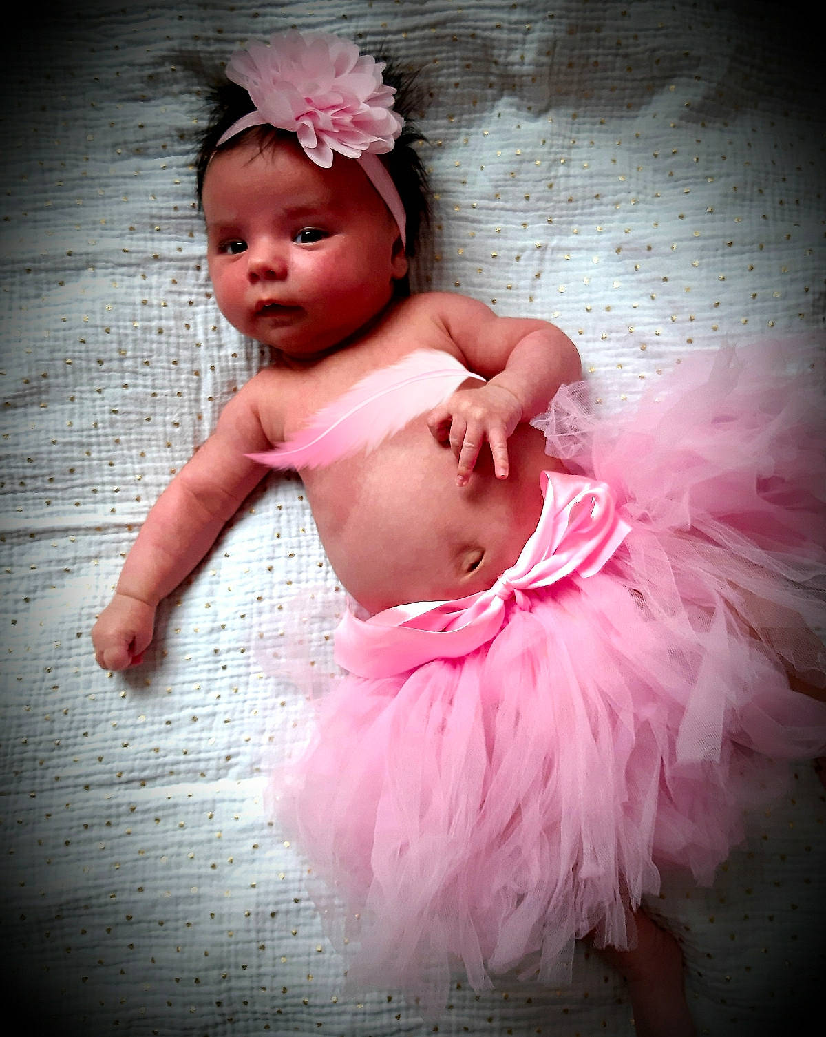 Séléna a rejoint le concours — aidez-le/la à gagner de superbes lots ! baby, baby_toddler_clothing, ballet_tutu, beauty, child, day_dress, embellishment, event, fashion_accessory, flash_photography, happy, headband, headpiece, magenta, peach, performing_arts, person, petal, pink, ruffle