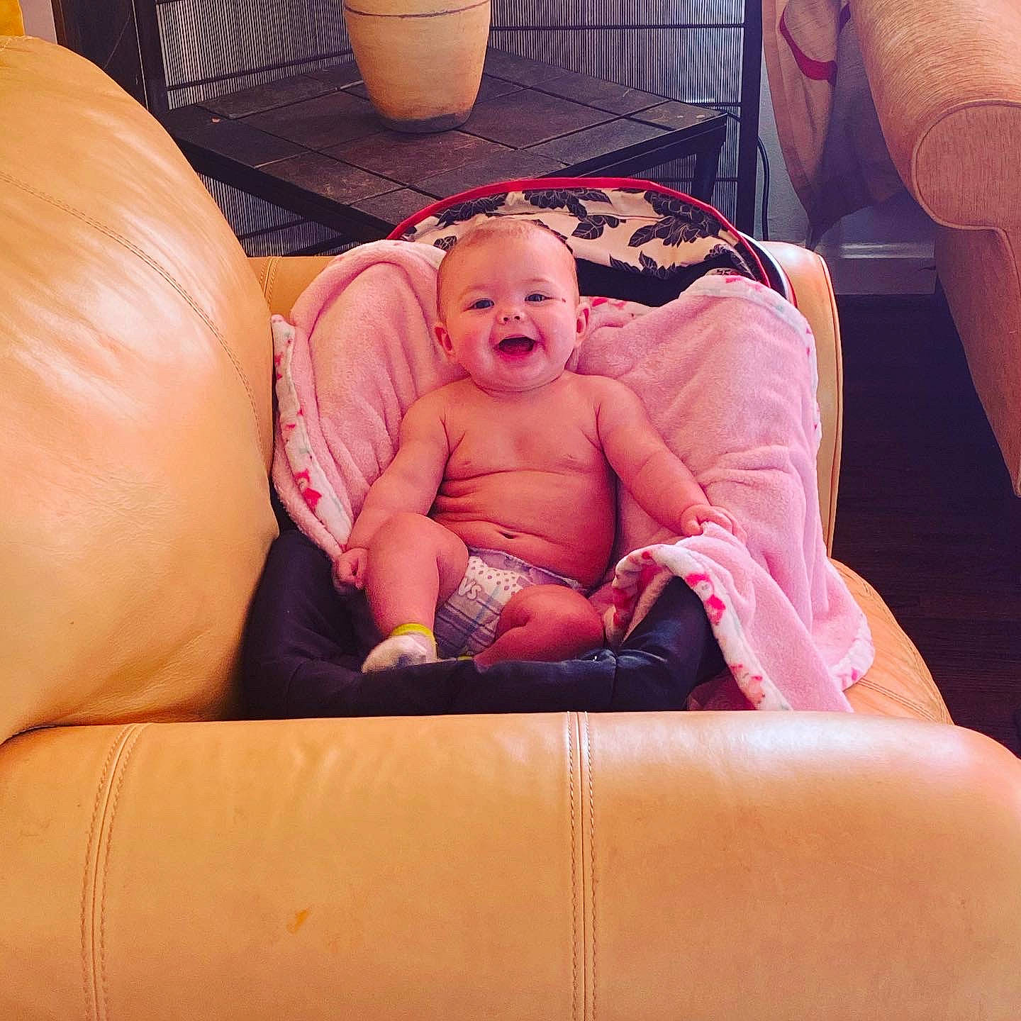Kyleigh is registered to the contest to win money with this photo: baby, baby_products, chair, cheek, chest, comfort, finger, furniture, hand, human_body, human_leg, lap, leg, mouth, nail, person, sitting, skin, thigh, thumb
