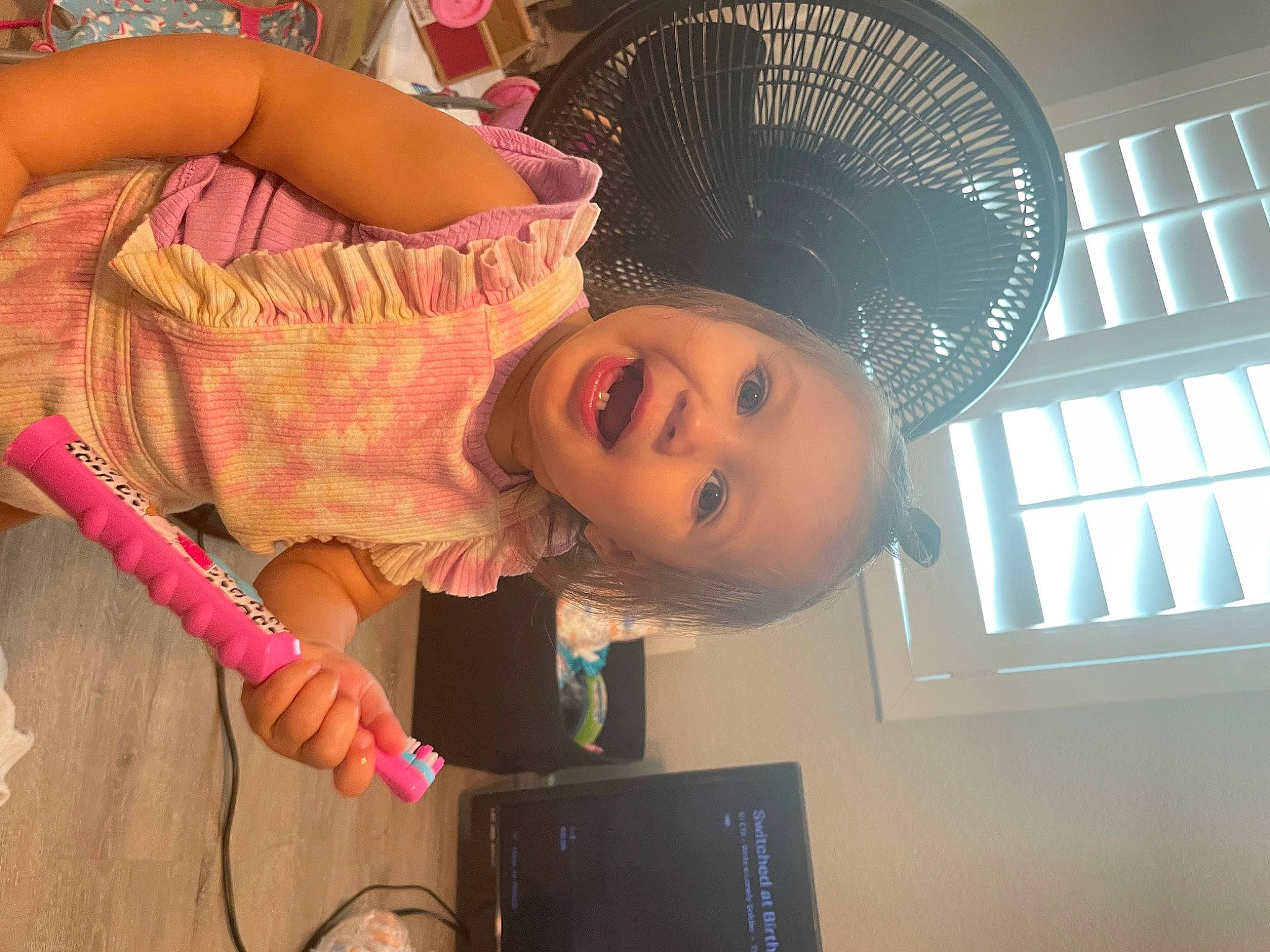 Oaklee is registered to the contest to win money with this photo: baby, child, eyelash, fashion_accessory, fun, happy, hat, leisure, magenta, mechanical_fan, organ, person, room, smile, sun_hat, toddler, window