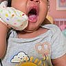 Amelia joined the competition — help win amazing prizes! baby, yawning, mitten, polka_dot, tshirt, sun, skateboard, nursery, cute, infant, portrait, sleepy, child, indoor, colorful, clothing, hand, person, face, smile