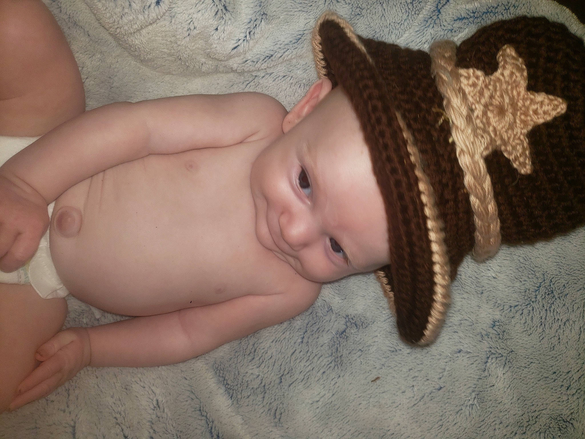 Morgan Shawn is registered to the contest to win money with this photo: baby, baby_toddler_clothing, cap, cheek, child, costume_hat, eye, eyelash, face, fashion_accessory, fawn, finger, head, headband, human_body, iris, joy, lip, pattern, person