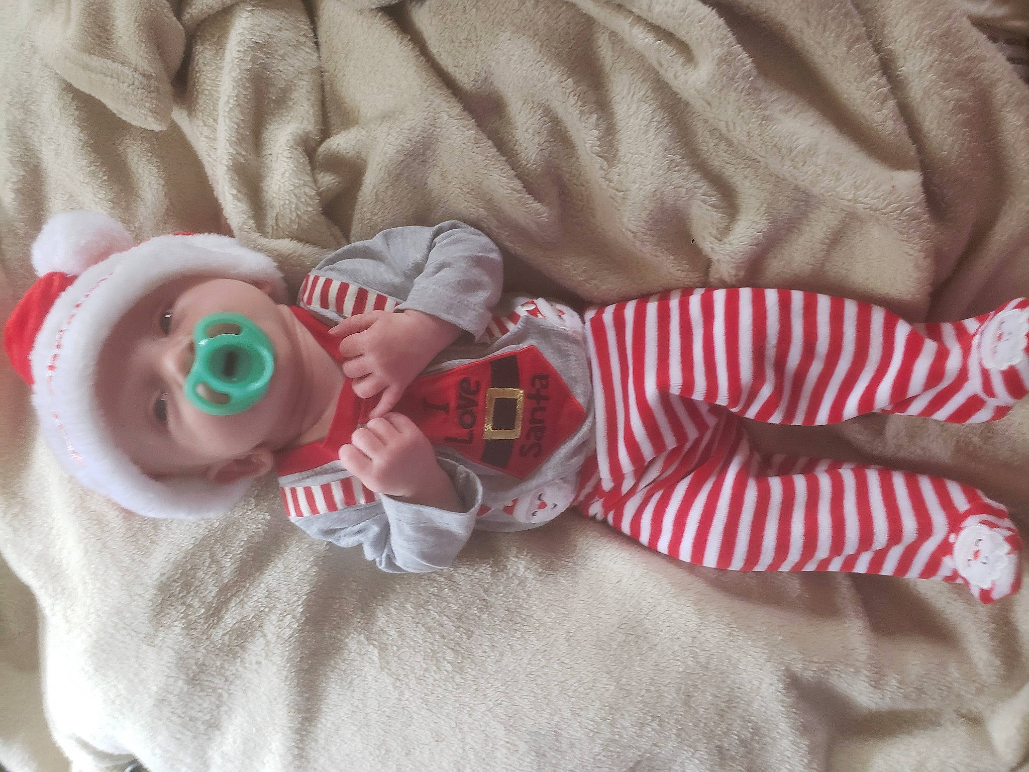 Morgan Shawn is registered to the contest to win money with this photo: baby, baby_products, baby_sleeping, baby_toddler_clothing, baby_toys, carmine, child, comfort, fictional_character, hand, head, headgear, linens, pattern, person, sleeve, sock, stuffed_toy, textile, toddler
