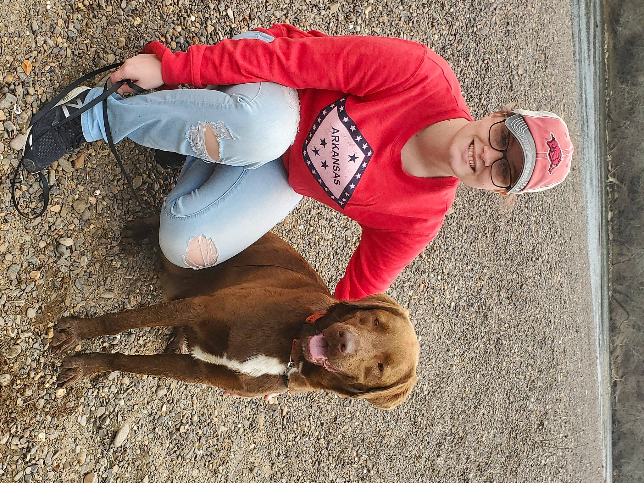 Milo joined the competition — help win amazing prizes! cap, carnivore, companion_dog, dog, dog_breed, fashion_accessory, fawn, fun, hat, human_leg, landscape, leash, leg, road_surface, shadow, smile, soil, sporting_group, tail, working_animal