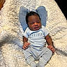 newborn, baby, infant, child, portrait, sleeping, lying_down, blanket, fluffy_blanket, blue_outfit, onesie, little_brother, socks, cushion, indoor, home, wood_floor, face, hands, family