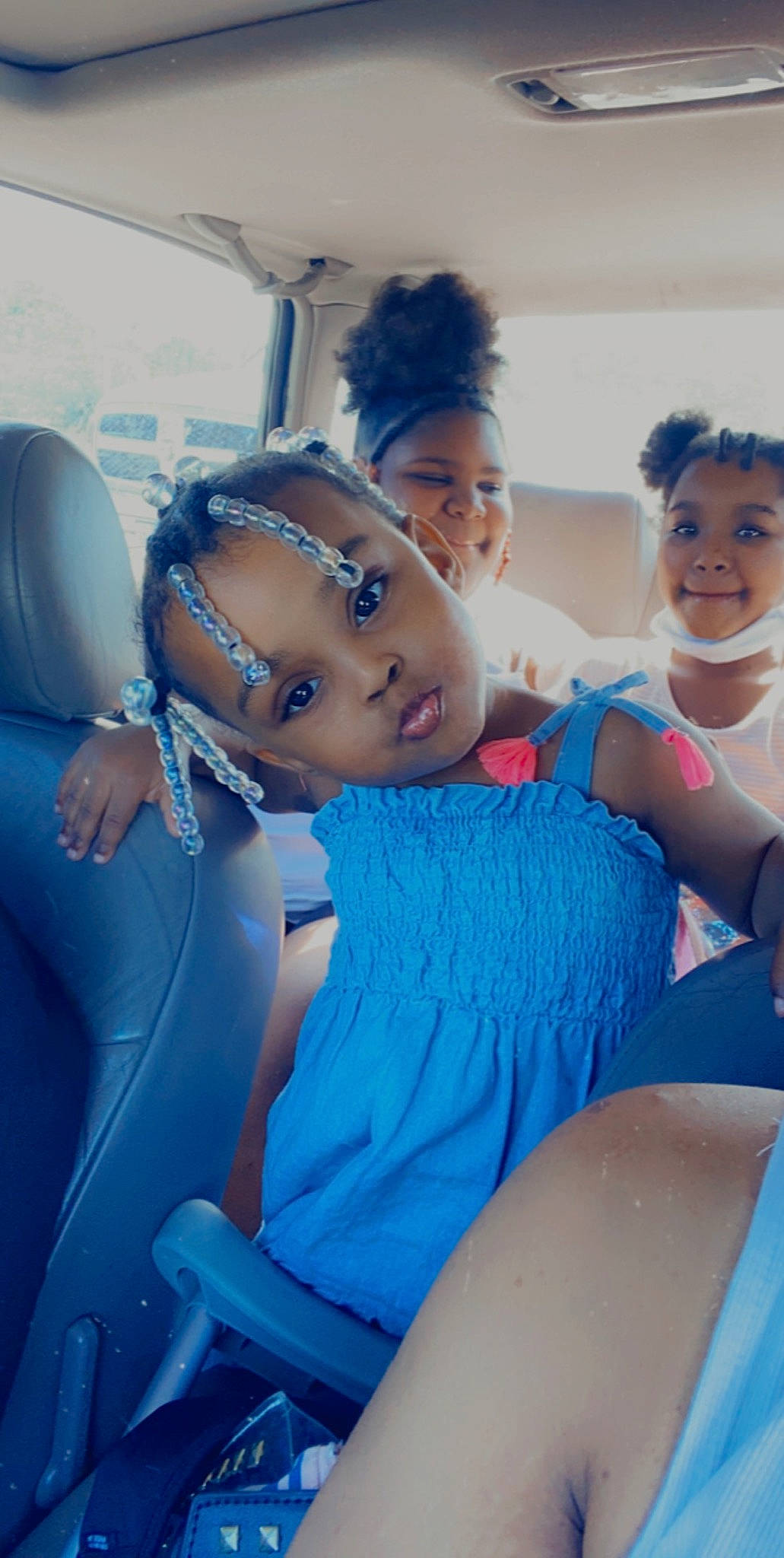 Maleah joined the competition — help win amazing prizes! baby_toddler_clothing, black_hair, car_seat, car_seat_cover, child, day_dress, dress, eye, hair, hairstyle, happy, head_restraint, joy, makeover, mouth, nose, one_piece_garment, person