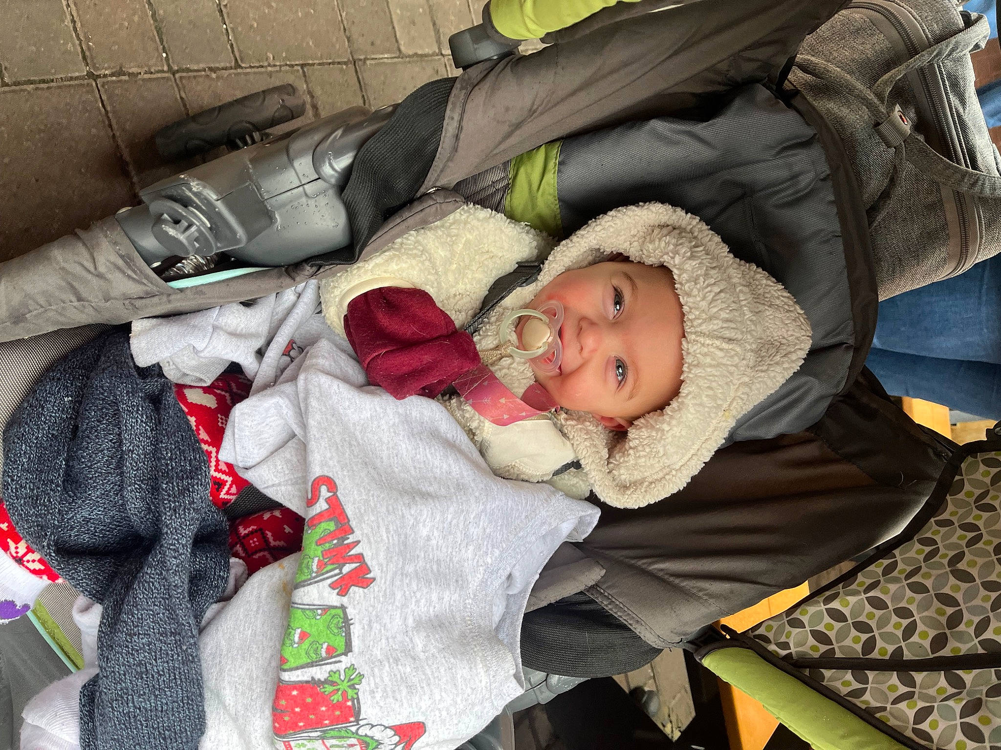 Brooklynne is registered to the contest to win money with this photo: baby, baby_carriage, baby_products, baby_toddler_clothing, beauty, carmine, cheek, child, comfort, face, grass, headwear, nap, person, product, sitting, skin, smile, textile, toddler