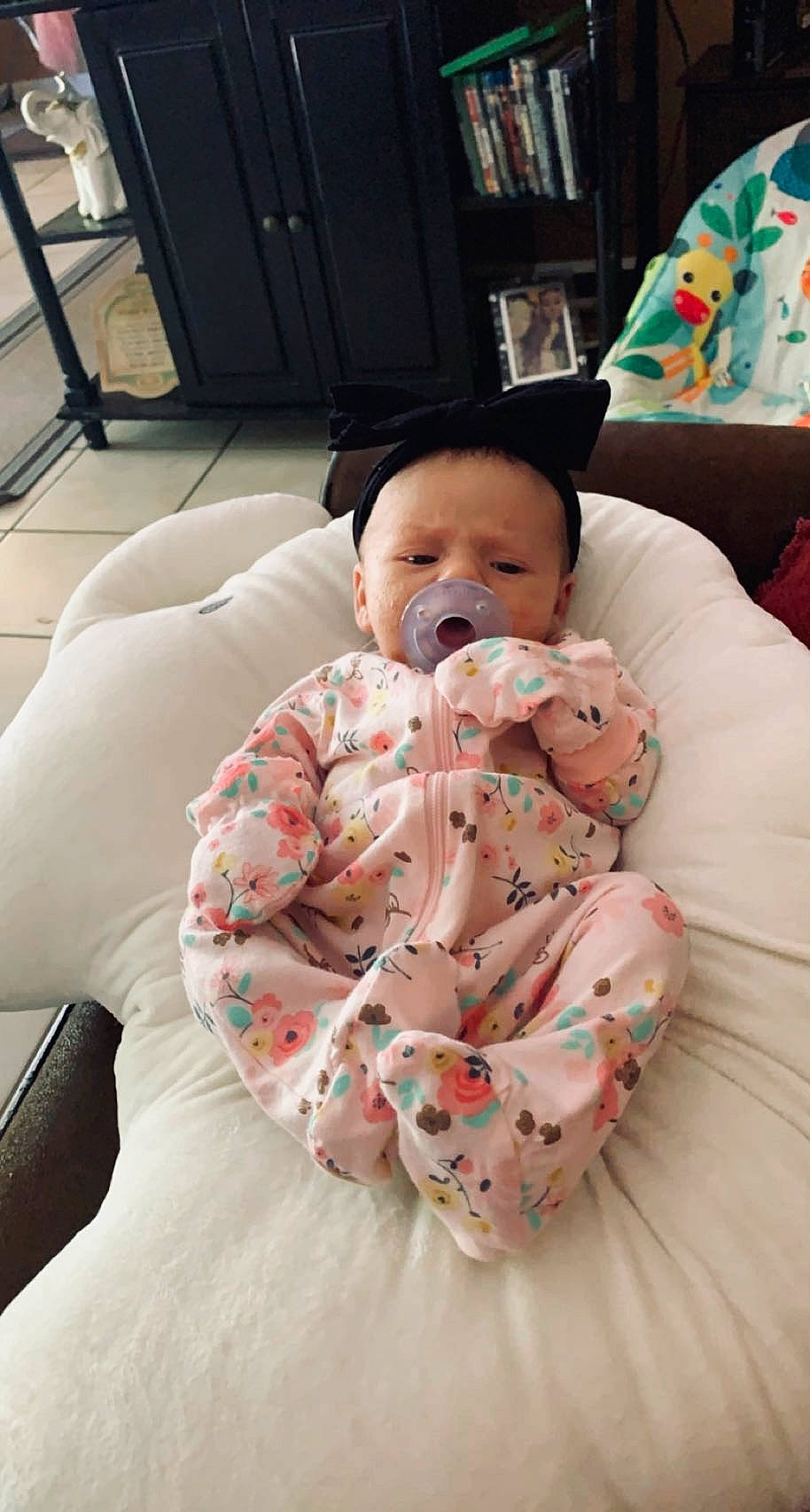 Chanell joined the competition — help win amazing prizes! arm, baby, baby_toddler_clothing, bedtime, cheek, child, comfort, event, eye, face, finger, head, human_body, linens, mouth, person, room, sitting, skin, textile