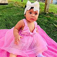 Ailany Charlotte is registered to the contest to win money with this photo: baby, backyard, bow, child, cute, face, fashion, grass, hair_bow, hand, infant, outdoor, photography, pink_blanket, pink_dress, portrait, sitting, sock, tulle, wide_eyed