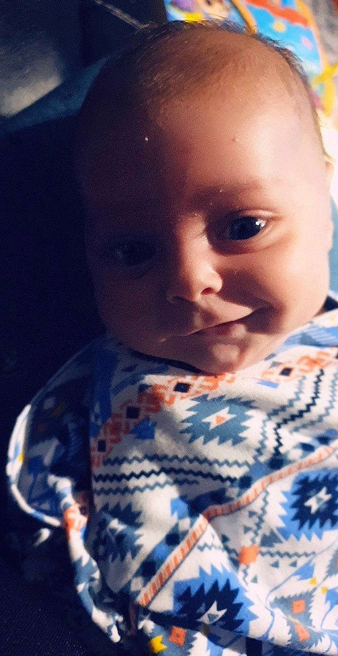 Kyran is registered to the contest to win money with this photo: baby, beauty, black_hair, blue, cheek, child, chin, cool, eye, face, forehead, head, lip, mouth, nose, people, person, photography, skin, smile