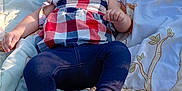 Yesenia is registered to the contest to win money with this photo: baby, blanket, child, clothing, cushion, face, foot, grass, happy, head, nature, outdoor, person, playground, relaxing, sand, summer, sunlight, swing, toy