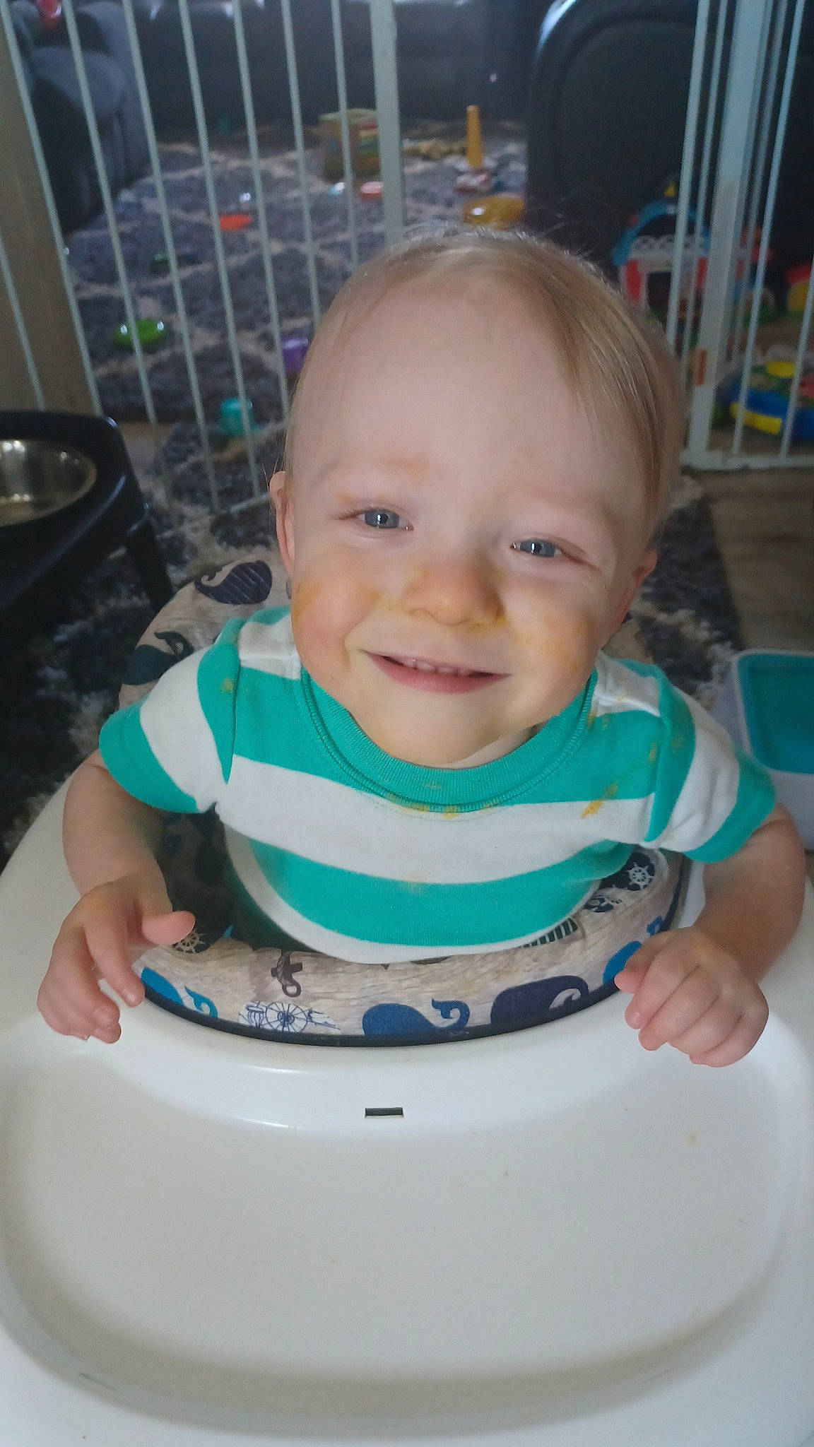 Kodi joined the competition — help win amazing prizes! baby, baby_products, baby_safety, baby_toddler_clothing, bib, bookcase, cheek, child, chin, eye, eyebrow, fun, hairstyle, iris, joy, mouth, person, sitting, skin, sleeve