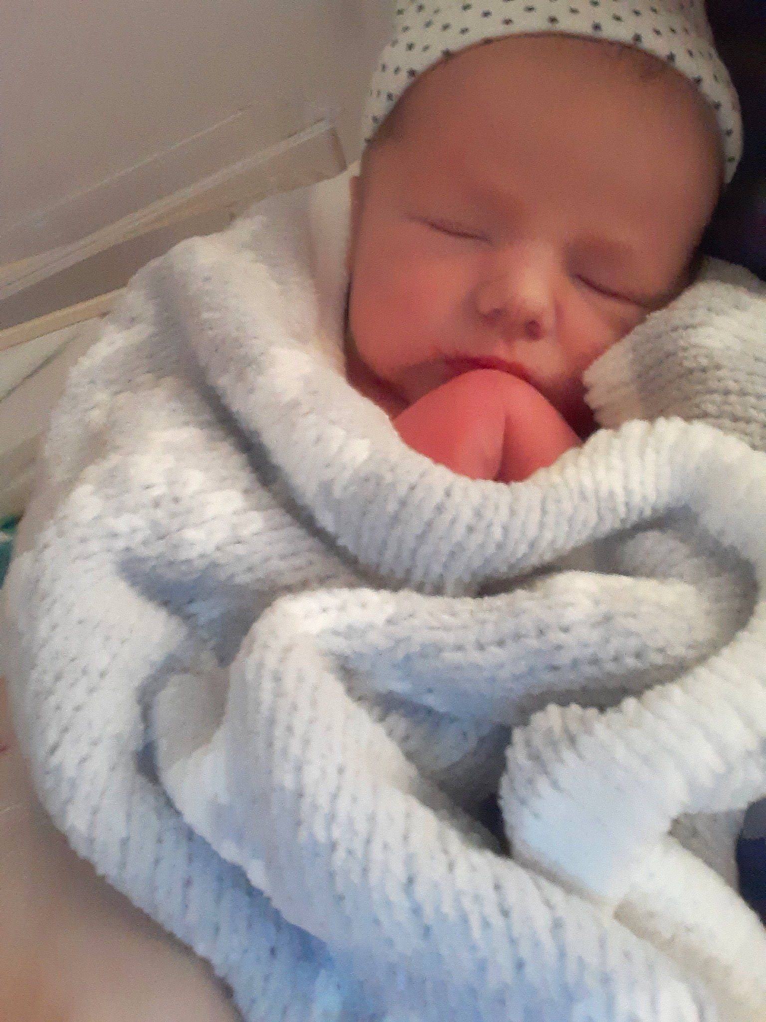 Logan is registered to the contest to win money with this photo: baby, baby_sleeping, cheek, child, knitting, mouth, nap, nose, person, sleep, textile, wool