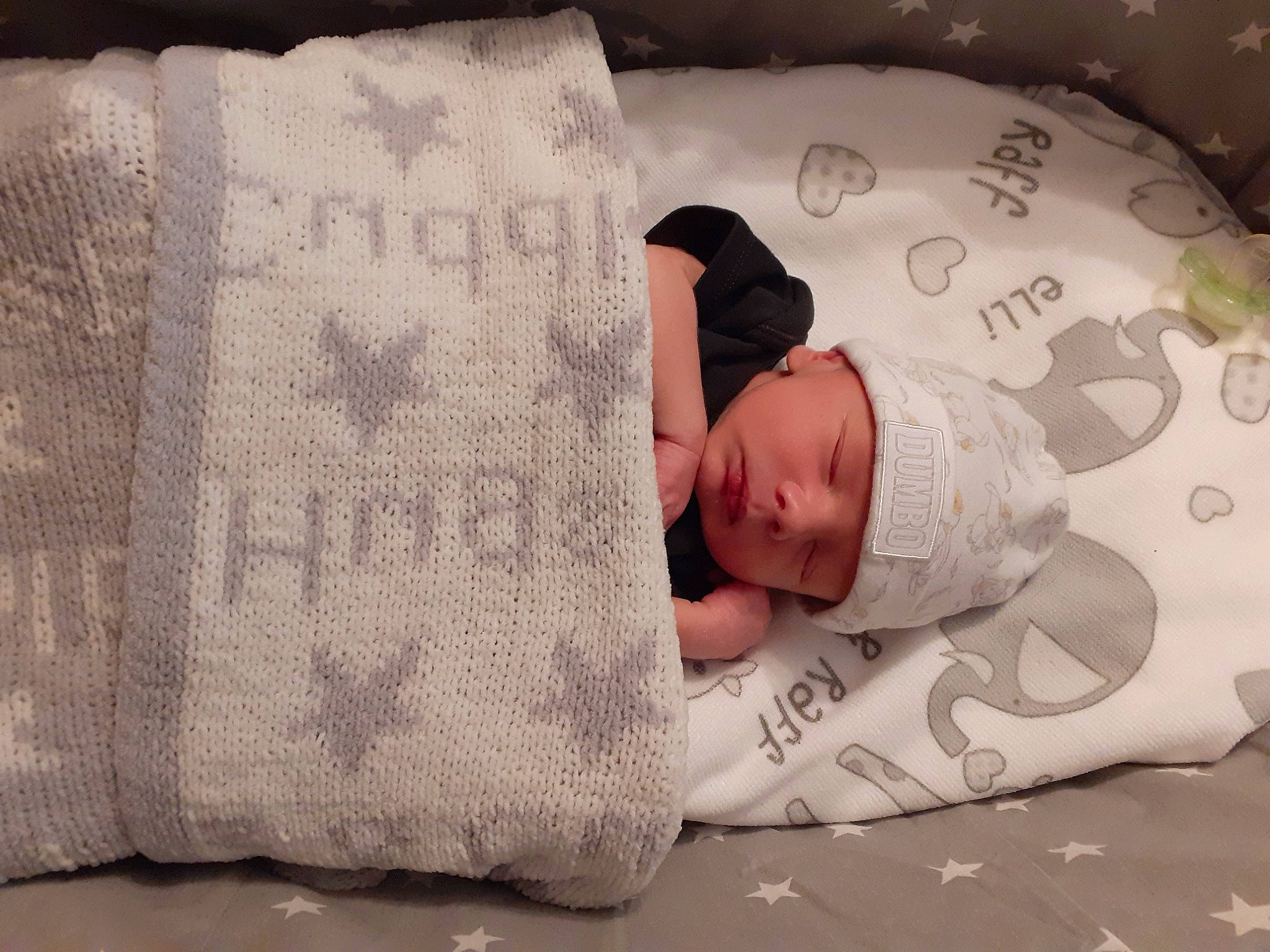 Logan is registered to the contest to win money with this photo: baby, child, comfort, headwear, linens, nap, person, pillow, sleep, textile