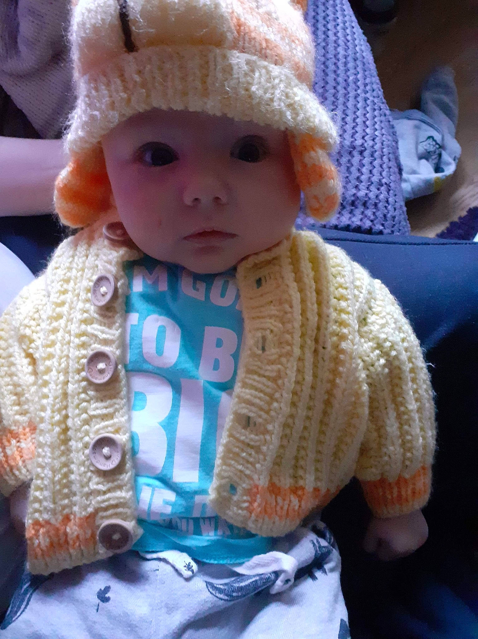 Logan is registered to the contest to win money with this photo: art, baby, child, crochet, doll, headwear, knitting, person, textile, toddler, toy, wool, woolen