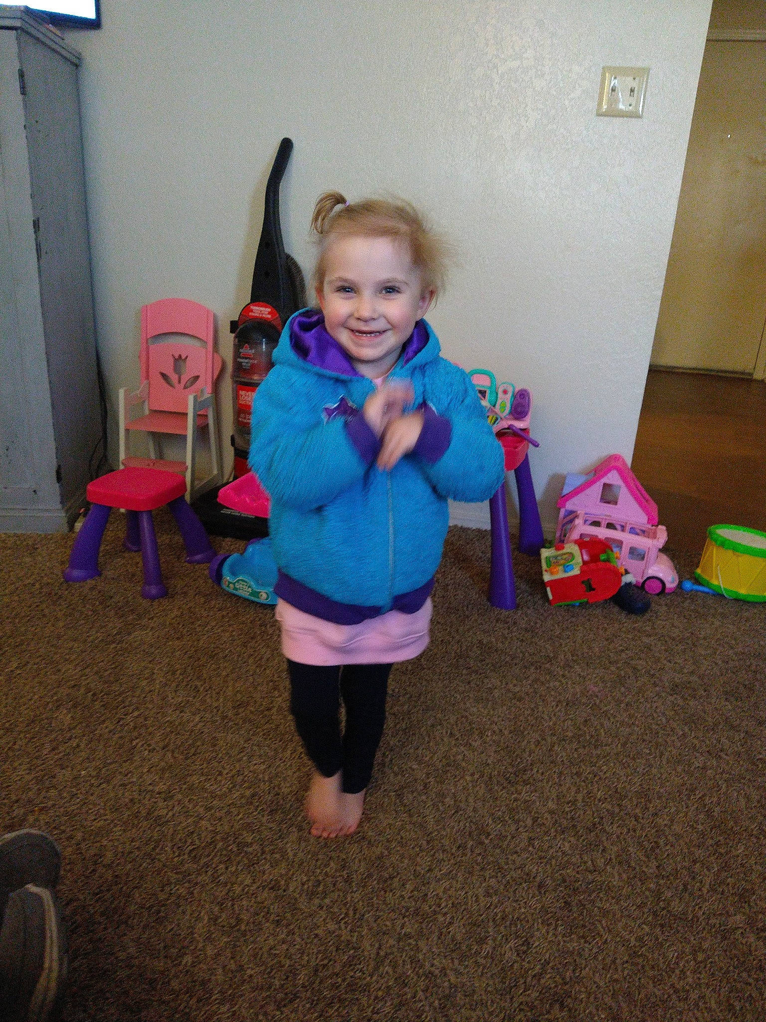 Torie-nicole is registered to the contest to win money with this photo: bag, chair, child, door, electric_blue, event, floor, flooring, fun, joint, joy, leisure, luggage_and_bags, magenta, person, play, recreation, room, sitting, smile