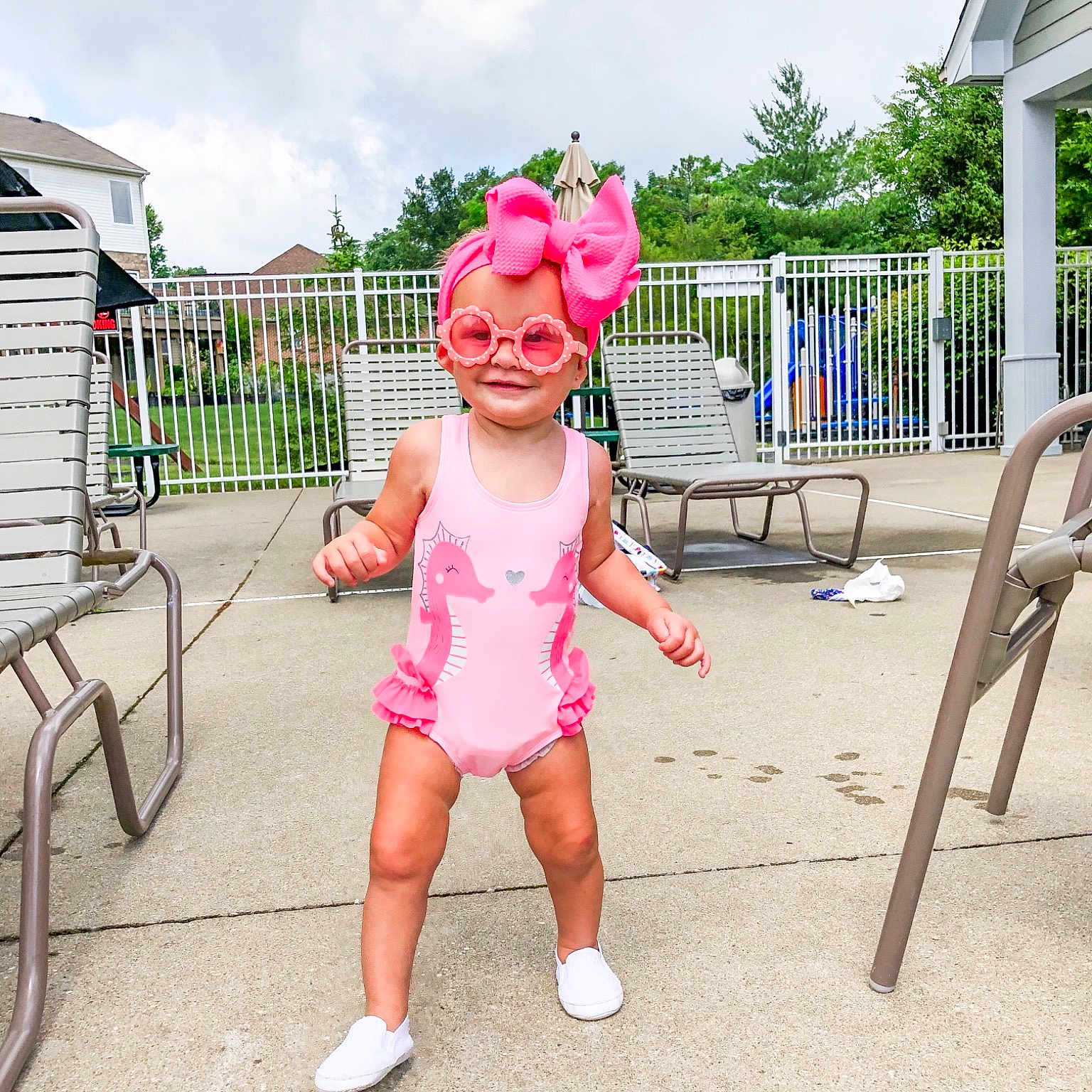 Kennadi is registered to the contest to win money with this photo: child, city, footwear, fun, happy, leisure, pink, play, playground, public_space, recreation, shoe, shorts, smile, summer, toddler, tourism, tree, vacation, walking