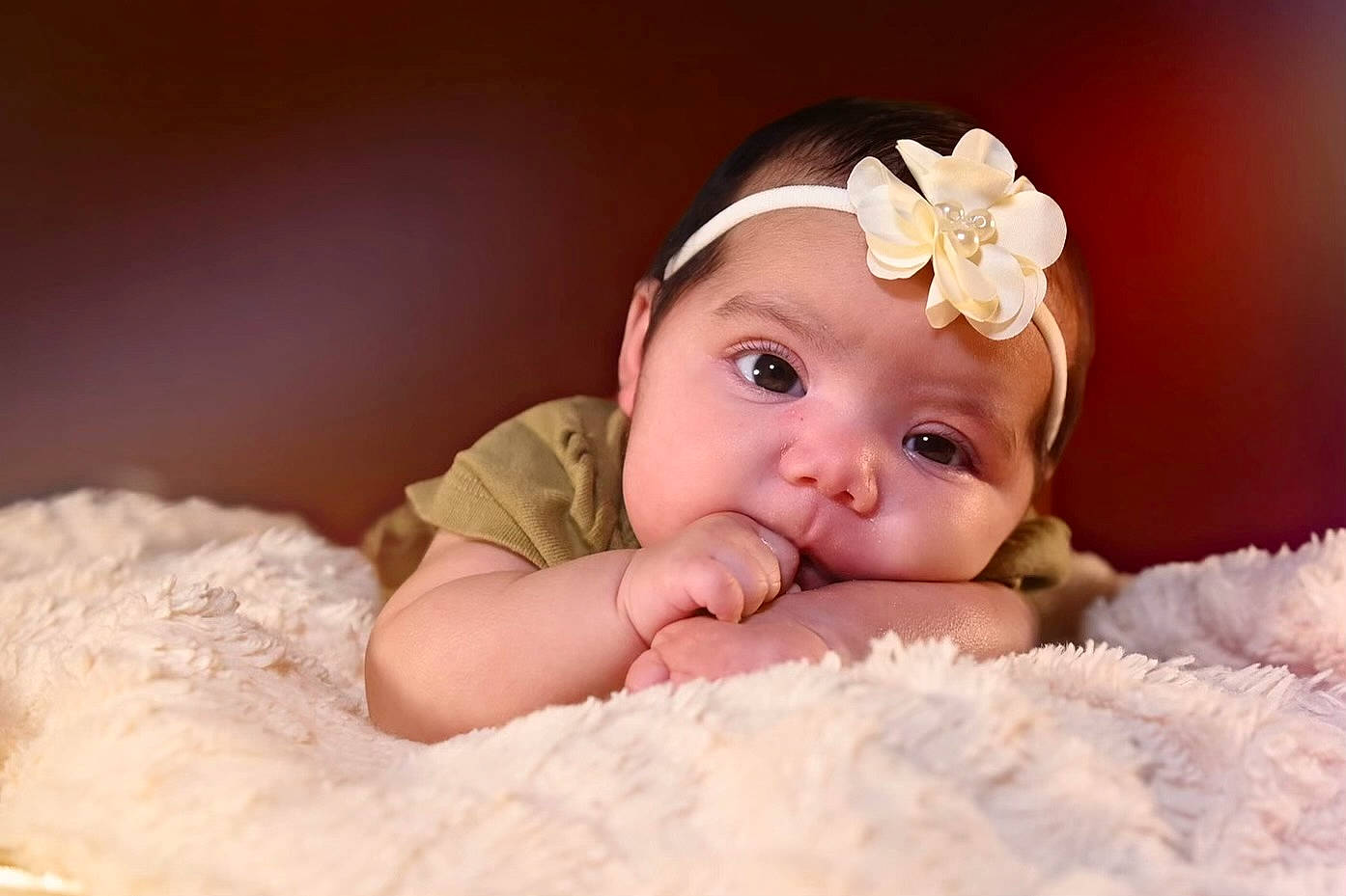Maleah joined the competition — help win amazing prizes! baby, baby_toddler_clothing, cheek, comfort, eye, finger, flash_photography, flower, fun, fur, hair_accessory, happy, headband, headgear, headpiece, headwear, iris, linens, person, petal